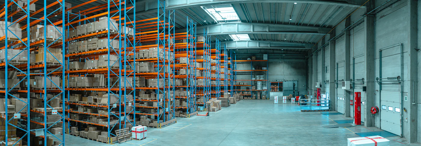 Warehouse racking stacked with stock